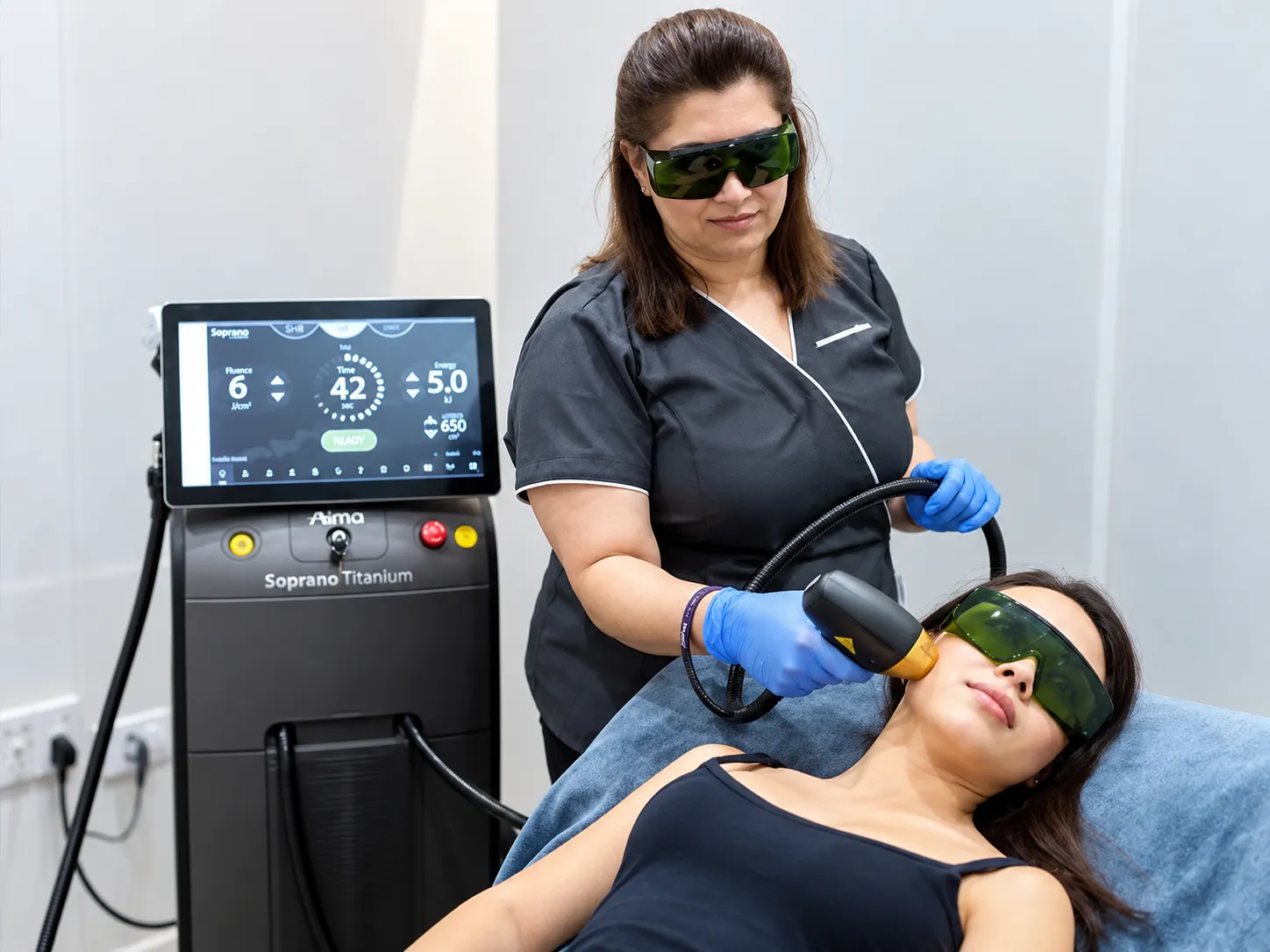 A Paradise Wellness doctor discussing a facial treatment plan with a client