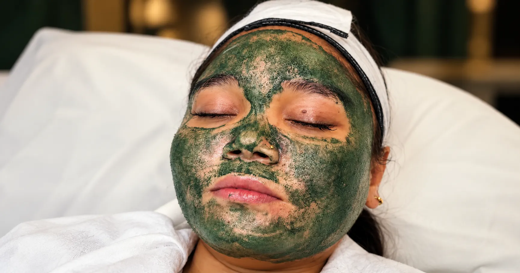 Client receiving Green Sea Peel treatment at Paradise Wellness Delhi